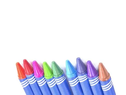 Crayon laying on bottom Selective focus isolated on white background Stock Photos
