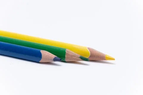 Crayons colored pencil in different colors crayon yellow green blue Stock Photos