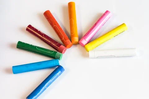 Crayons concept on white isolated background Stock Photos