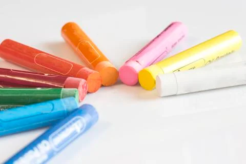 Crayons concept on white isolated background Stock Photos