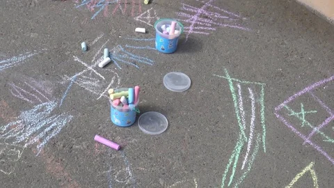 Crayons for drawing lying on the pavement Stock Footage 76214124