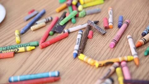 Crayons laying on a table Stock Footage 199384598