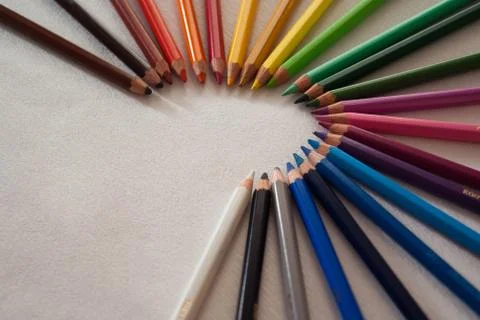 Crayons on the white table Stock Photos