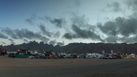 Crazy activity at the 2022 dakar rally camp seen from a timelapse point of Stock Footage 171289492