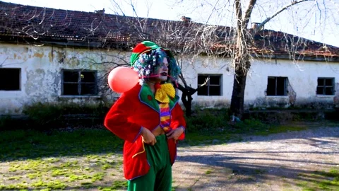 Crazy Clown with a baloon Stock Footage 117719760
