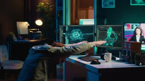 Crazy computer scientist doing worshiping reverence in front of self aware AI Stock Footage 266953897