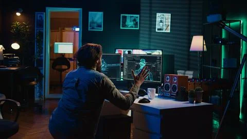 Crazy computer scientist doing worshiping reverence in front of self aware AI 스톡 사진