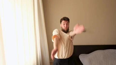 Crazy dance of a young bearded guy. Stock Footage 278798780