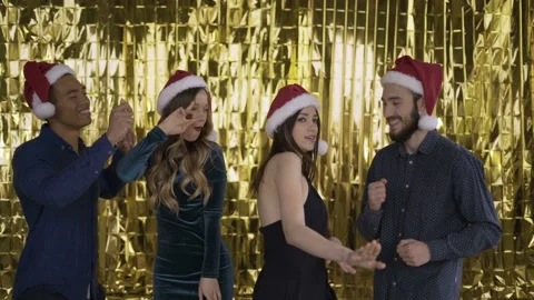 Crazy dancing! 4 friends dancing at a christmas party. 4K Stock Footage 108774386