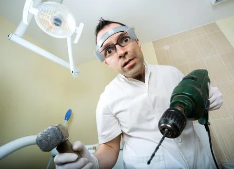 Crazy dentist Stock Photos