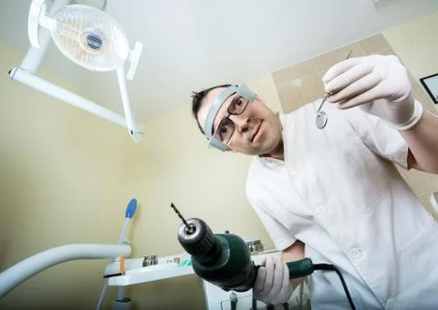 Crazy dentist Stock Photos
