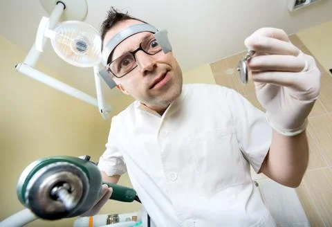 Crazy dentist Stock Photos