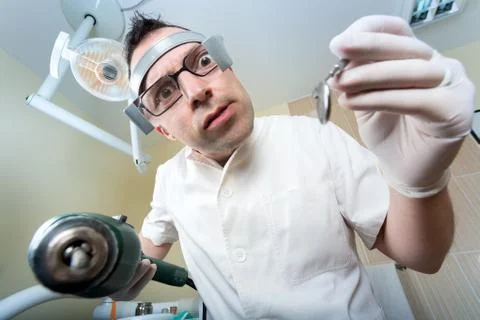 Crazy dentist Stock Photos