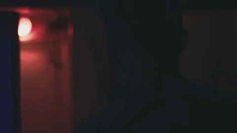 Crazy doctor maniac wanders through the corridors of an abandoned laboratory Stock Footage 76603338