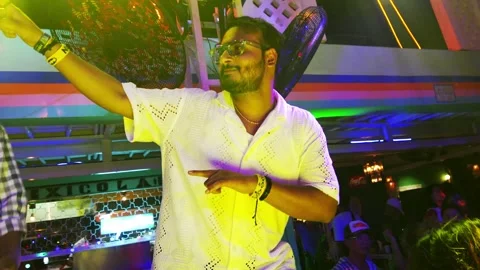 Crazy Drunk Indian dancing under club lights Stock Footage 337885795