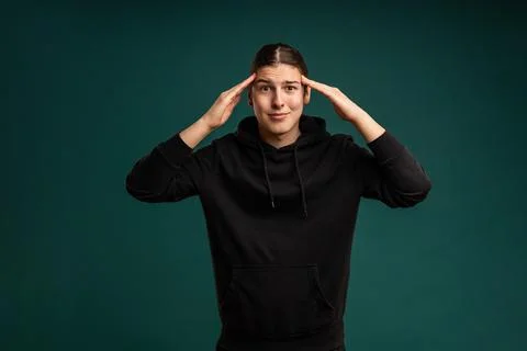 Crazy expression of a young man. Cropped studio portrait of male mood Stock Photos