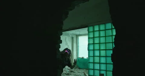 Crazy female scientist experiencing virtual reality. Mad female inventor in Stockbeeldmateriaal 142372147