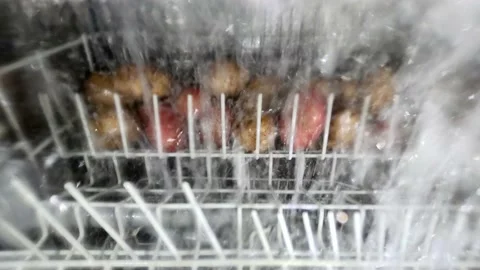 Crazy funny idea concept. Washing vegetables in the dishwasher. Vegetables in 스톡 동영상 151087481