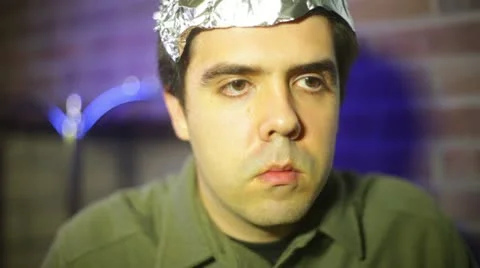 Crazy guy drinking tea drink tin foil hat 스톡 동영상 12416943