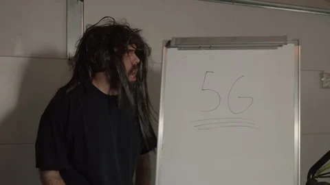 Crazy guy mad about 5g 스톡 동영상 138971189