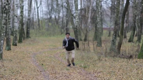 Crazy guy running, jumping, happy, having fun Stock Footage 82255638