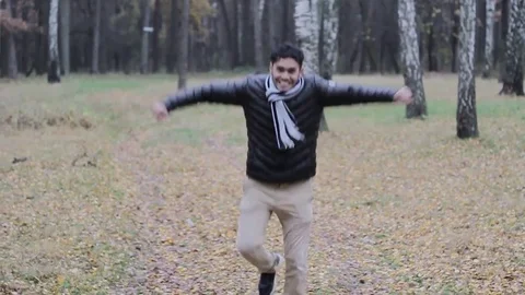 Crazy guy running, jumping, happy, having fun Stock Footage 82304101