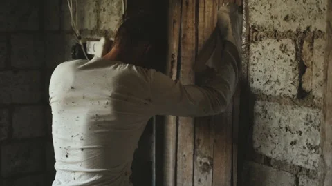 Crazy Horrible Maniac In Basement With Window Vídeo Stock 116082627