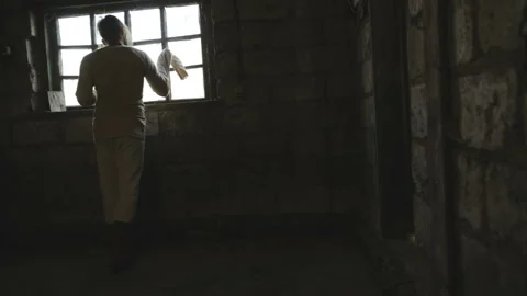 Crazy Horrible Maniac In Basement With Window Stock Footage 116094574