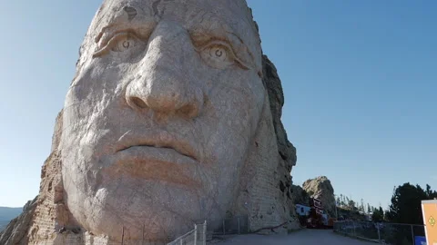 Crazy Horse Monument seen from the top, facing the face of the memorial in Stock Footage