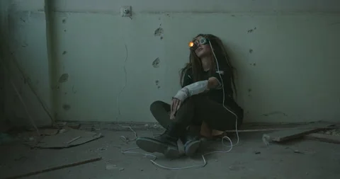 Crazy inventor testing handmade VR glasses. Mad female scientist in dirty Stock Footage 142239967