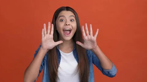 Crazy kid share message proclaim hand mouth isolated scarlet color background Stock Footage 166900719