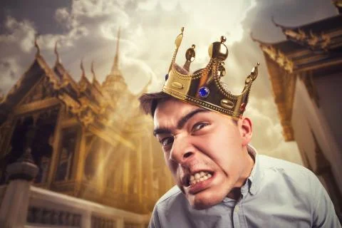 Crazy man with crown Stock Photos
