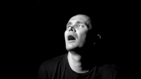 Crazy Man Experiences A Attack Of Paranoia Looks In Camera Video stock 128311782