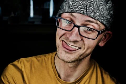 Crazy man in grey cap Stock Photos