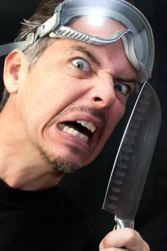 Crazy man with knife Stock Photos