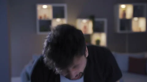 Crazy man with mental illness is going crazy at home. 스톡 동영상 222479475