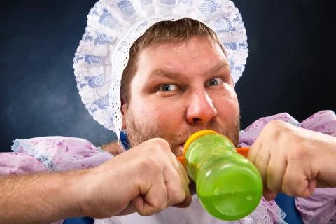 Crazy man with a pacifier Foto stock
