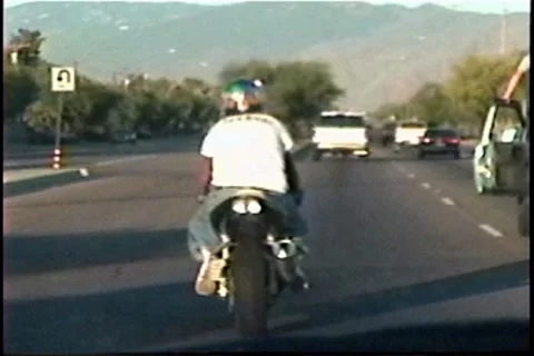 Crazy motorist exits vehicle while driving Stockbeeldmateriaal 7751514