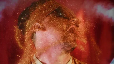 Crazy positive fun face man in gold glitter.Comical video shake head funny Stock Footage 248367071