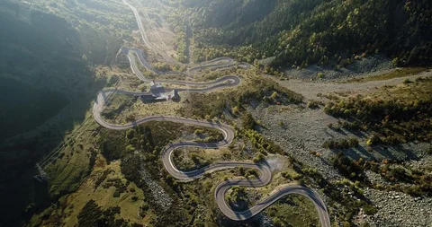 Crazy road layout up mountain in Baqueira, Spain drone aerial 4k Stock Footage 125757799