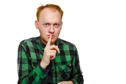 Crazy, scared red haired man show gesture silence. angry caucasian male geek Stock Photos