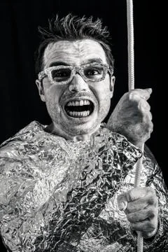 Crazy spaceman with rope Stock Photos