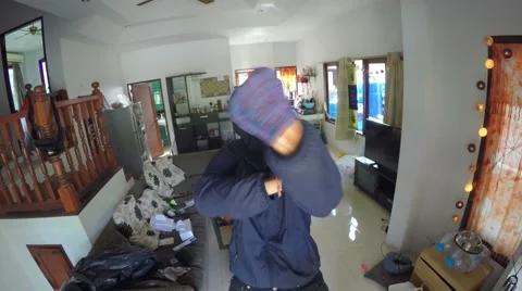 Crazy Сriminal Thief Threatening in Camera During Robbery Stock Footage 67693213