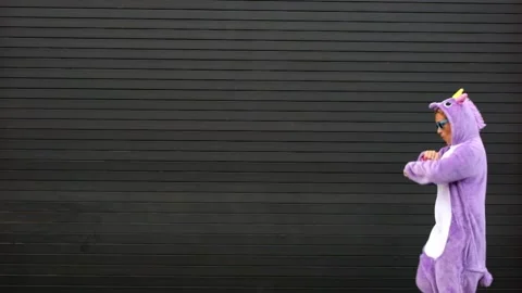 Crazy unicorn mask dance with funny people Stock Footage 141580375