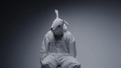 Crazy, weird man having an attack in a white room. Madness concept. Stock Footage 148486091