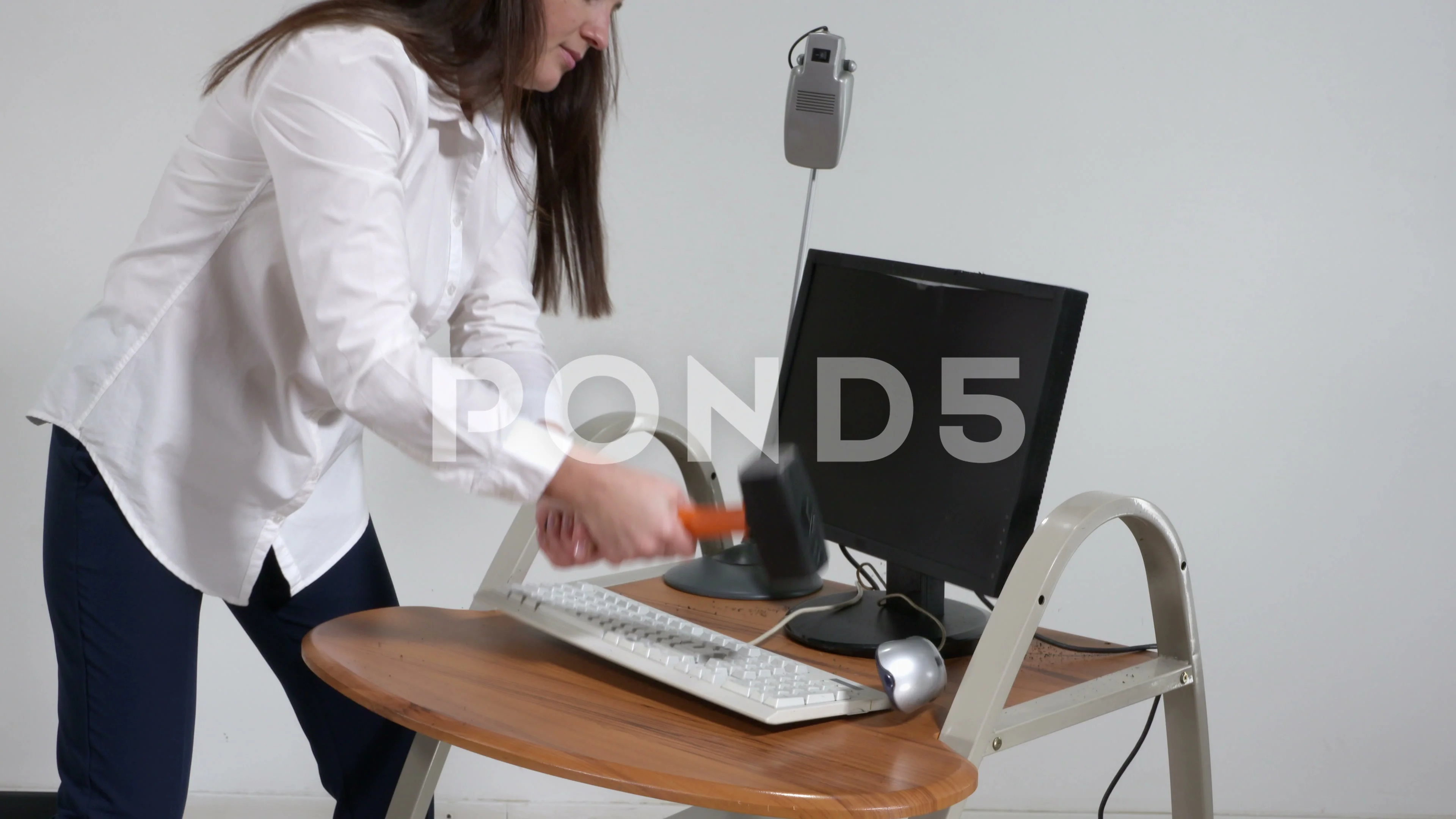 Crazy woman office worker destroying com... | Stock Video | Pond5