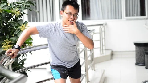 Crazy young asian man dancing in weird style. Funny moment of handsome east a Stock Footage 95141483