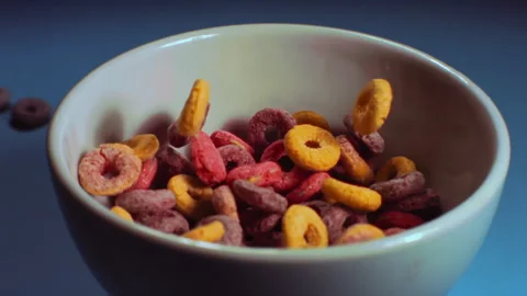 Creals fall into the cup slowly in super slow motion Stock Footage 274263124