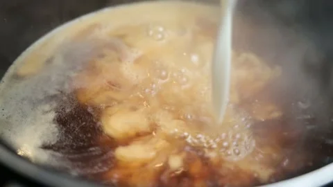 Cream Added To Boiling Sauce Stock-Footage 138612085