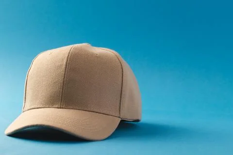 Cream baseball cap and copy space on blue background イラスト素材